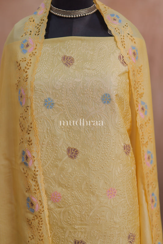 PASTEL YELLOW CUT WORK TUSSAR SUIT SET