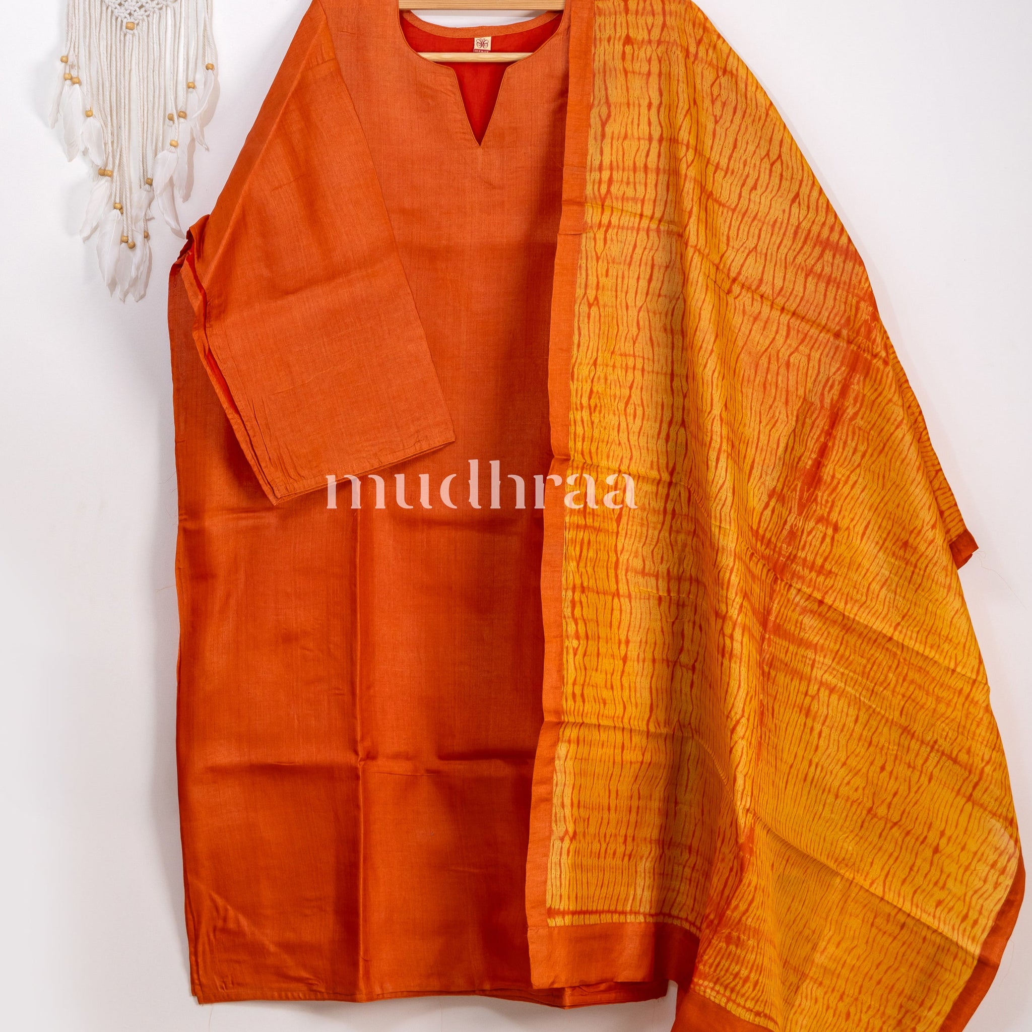Marmalade orange semi-stitched tussar suit set