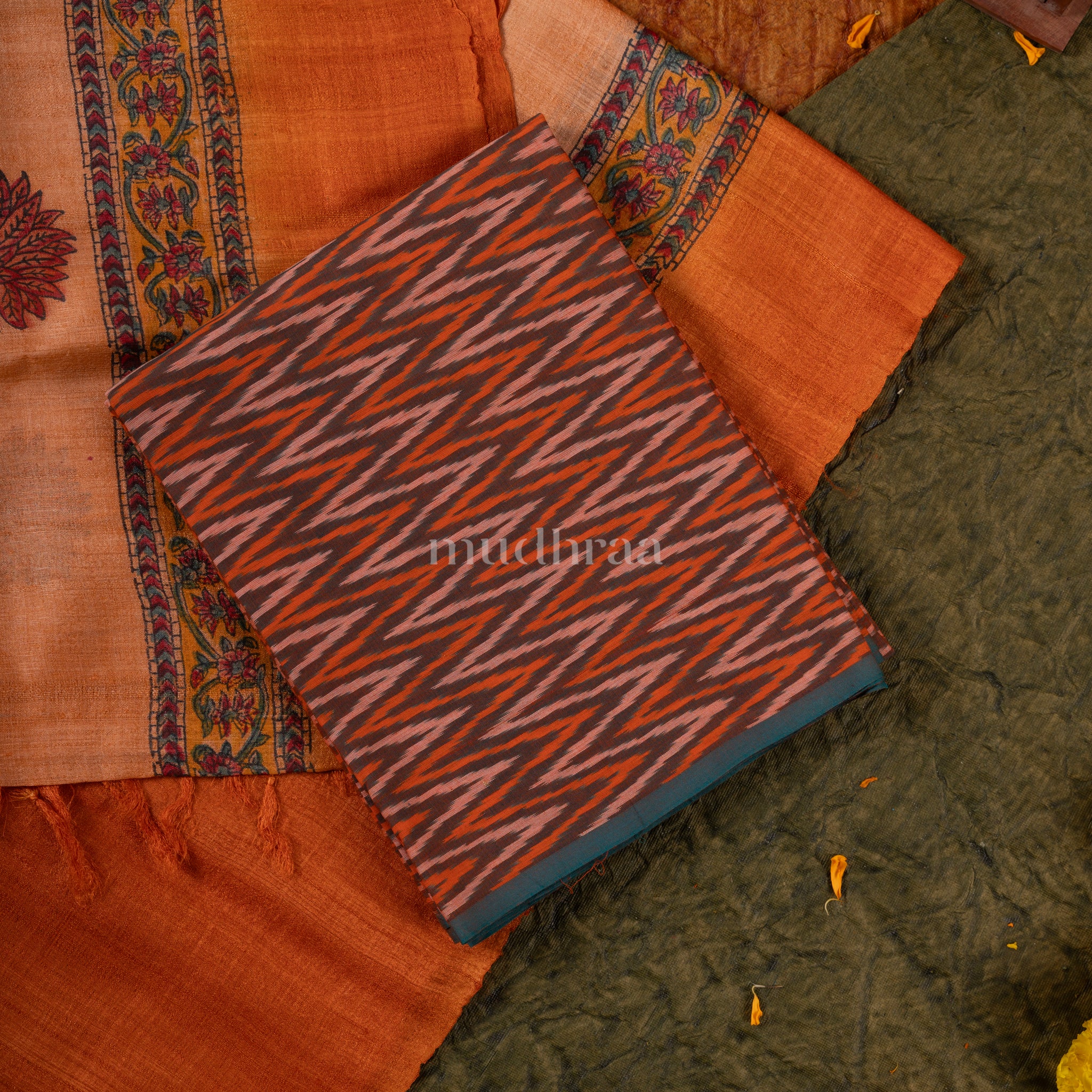 Orange hued Ikkat-tussar suit set